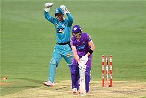 BRISBANE, AUSTRALIA - DECEMBER 30: Wil Parker of the Hurricanes is clean bowled by Mujeeb Ur Rahman of the Heat during the Big Bash League match between the Hobart Hurricanes and Brisbane Heat at The Gabba, on December 30, 2020, in Brisbane, Australia. (Photo by Bradley Kanaris/Getty Images)