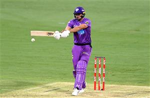 BRISBANE, AUSTRALIA - DECEMBER 30: Tim David of the Hurricanes plays a shot during the Big Bash League match between the Hobart Hurricanes and Brisbane Heat at The Gabba, on December 30, 2020, in Brisbane, Australia. (Photo by Bradley Kanaris/Getty Images)
