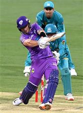 BRISBANE, AUSTRALIA - DECEMBER 30: Ben McDermott of the Hurricanes is bowled out by Mujeeb Ur Rahman of the Heat during the Big Bash League match between the Hobart Hurricanes and Brisbane Heat at The Gabba, on December 30, 2020, in Brisbane, Australia. (Photo by Bradley Kanaris/Getty Images)