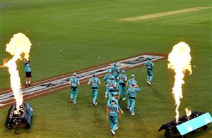 BRISBANE, AUSTRALIA - DECEMBER 30: The Heat players enter the field of play during the Big Bash League match between the Hobart Hurricanes and Brisbane Heat at The Gabba, on December 30, 2020, in Brisbane, Australia. (Photo by Bradley Kanaris/Getty Images)