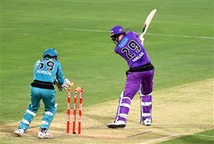 BRISBANE, AUSTRALIA - DECEMBER 30: Dawid Malan of the Hurricanes is bowled out by Mujeeb Ur Rahman of the Heat during the Big Bash League match between the Hobart Hurricanes and Brisbane Heat at The Gabba, on December 30, 2020, in Brisbane, Australia. (Photo by Bradley Kanaris/Getty Images)