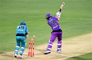 BRISBANE, AUSTRALIA - DECEMBER 30: Dawid Malan of the Hurricanes is bowled out by Mujeeb Ur Rahman of the Heat during the Big Bash League match between the Hobart Hurricanes and Brisbane Heat at The Gabba, on December 30, 2020, in Brisbane, Australia. (Photo by Bradley Kanaris/Getty Images)