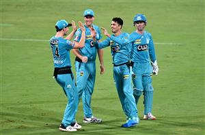 BRISBANE, AUSTRALIA - DECEMBER 30: Mujeeb Ur Rahman of the Heat celebrates taking the wicket of Dawid Malan of the Hurricanes during the Big Bash League match between the Hobart Hurricanes and Brisbane Heat at The Gabba, on December 30, 2020, in Brisbane, Australia. (Photo by Bradley Kanaris/Getty Images)