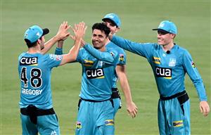 BRISBANE, AUSTRALIA - DECEMBER 30: Mujeeb Ur Rahman of the Heat celebrates taking the wicket of Wil Parker of the Hurricanes during the Big Bash League match between the Hobart Hurricanes and Brisbane Heat at The Gabba, on December 30, 2020, in Brisbane, Australia. (Photo by Bradley Kanaris/Getty Images)