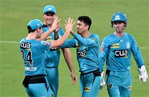 BRISBANE, AUSTRALIA - DECEMBER 30: Mujeeb Ur Rahman of the Heat celebrates taking the wicket of Dawid Malan of the Hurricanes during the Big Bash League match between the Hobart Hurricanes and Brisbane Heat at The Gabba, on December 30, 2020, in Brisbane, Australia. (Photo by Bradley Kanaris/Getty Images)