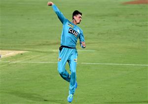 BRISBANE, AUSTRALIA - DECEMBER 30: Mujeeb Ur Rahman of the Heat celebrates taking the wicket of Dawid Malan of the Hurricanes during the Big Bash League match between the Hobart Hurricanes and Brisbane Heat at The Gabba, on December 30, 2020, in Brisbane, Australia. (Photo by Bradley Kanaris/Getty Images)