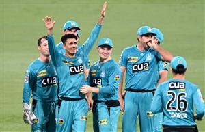 BRISBANE, AUSTRALIA - DECEMBER 30: Mujeeb Ur Rahman of the Heat celebrates taking the wicket of Scott Bolland of the Hurricanes during the Big Bash League match between the Hobart Hurricanes and Brisbane Heat at The Gabba, on December 30, 2020, in Brisbane, Australia. (Photo by Bradley Kanaris/Getty Images)
