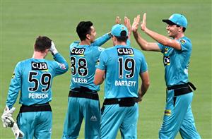 BRISBANE, AUSTRALIA - DECEMBER 30: Mujeeb Ur Rahman of the Heat celebrates taking the wicket of Ben McDermott of the Hurricanes during the Big Bash League match between the Hobart Hurricanes and Brisbane Heat at The Gabba, on December 30, 2020, in Brisbane, Australia. (Photo by Bradley Kanaris/Getty Images)