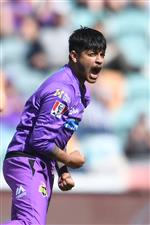 HOBART, AUSTRALIA - JANUARY 04: Sandeep Lamichhane of the Hurricanes celebrates the wicket of Glenn Maxwell of the Stars
during the Big Bash League match between the Melbourne Stars and the Hobart Hurricanes at Blundstone Arena, on January 04, 2021, in Hobart, Australia. (Photo by Steve Bell/Getty Images)