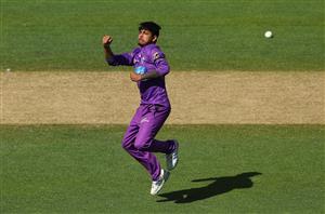HOBART, AUSTRALIA - JANUARY 04: Sandeep Lamichhane of the Hurricanes celebrates taking the wicket of Glenn Maxwell of the Melbourne Stars during the Big Bash League match between the Melbourne Stars and the Hobart Hurricanes at Blundstone Arena, on January 04, 2021, in Hobart, Australia. (Photo by Robert Cianflone/Getty Images)