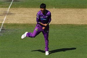 HOBART, AUSTRALIA - JANUARY 04: Sandeep Lamichhane of the Hurricanes celebrates taking the wicket of Glenn Maxwell of the Melbourne Stars during the Big Bash League match between the Melbourne Stars and the Hobart Hurricanes at Blundstone Arena, on January 04, 2021, in Hobart, Australia. (Photo by Robert Cianflone/Getty Images)