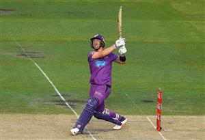 HOBART, AUSTRALIA - JANUARY 04: Ben McDermott of the Hurricanes hits a six onto the stadium roof during the Big Bash League match between the Melbourne Stars and the Hobart Hurricanes at Blundstone Arena, on January 04, 2021, in Hobart, Australia. (Photo by Robert Cianflone/Getty Images)