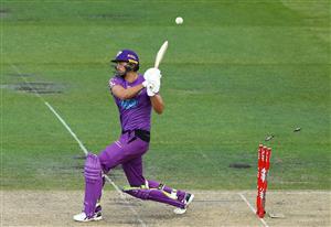 HOBART, AUSTRALIA - JANUARY 04: Tim David of the Hurricanes is bowled by Sam Rainbird of the Melbourne Stars during the Big Bash League match between the Melbourne Stars and the Hobart Hurricanes at Blundstone Arena, on January 04, 2021, in Hobart, Australia. (Photo by Robert Cianflone/Getty Images)