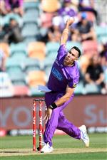 HOBART, AUSTRALIA - JANUARY 04: Scott Boland of the Hurricanes bowls during the Big Bash League match between the Melbourne Stars and the Hobart Hurricanes at Blundstone Arena, on January 04, 2021, in Hobart, Australia. (Photo by Steve Bell/Getty Images)