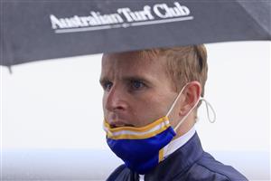 SYDNEY, AUSTRALIA - JANUARY 02: Tommy Berry on Snowfire returns to scale after winning race 8 the TAB Handicap during Sydney Racing on the Kensington track at Royal Randwick Racecourse on January 02, 2021 in Sydney, Australia. (Photo by Mark Evans/Getty Images)