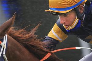 SYDNEY, AUSTRALIA - JANUARY 02: Tommy Berry on Snowfire wins race 8 the TAB Handicap during Sydney Racing on the Kensington track at Royal Randwick Racecourse on January 02, 2021 in Sydney, Australia. (Photo by Mark Evans/Getty Images)