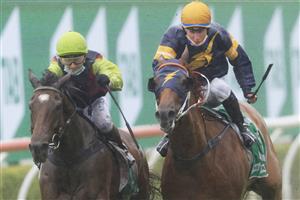 SYDNEY, AUSTRALIA - JANUARY 02: Tommy Berry on Snowfire wins race 8 the TAB Handicap during Sydney Racing on the Kensington track at Royal Randwick Racecourse on January 02, 2021 in Sydney, Australia. (Photo by Mark Evans/Getty Images)
