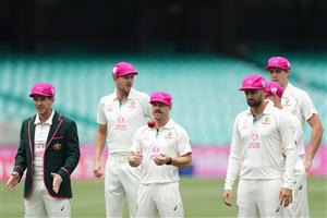 SYDNEY, AUSTRALIA - JANUARY 05: Tim Paine and David Warner of Australia pose for a team photo during an Australian nets session at the Sydney Cricket Ground on January 05, 2021 in Sydney, Australia. (Photo by Mark Metcalfe/Getty Images)