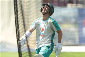SYDNEY, AUSTRALIA - JANUARY 05: David Warner of Australia laughs on as he bats during an Australian nets session at the Sydney Cricket Ground on January 05, 2021 in Sydney, Australia. (Photo by Mark Metcalfe/Getty Images)
