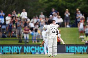 CHRISTCHURCH, NEW ZEALAND - JANUARY 05: Henry Nicholls of New Zealand (R) is congratulated by Kane Williamson of New Zealand after scoring a century during day three of the Second Test match in the series between New Zealand and Pakistan at Hagley Oval on January 05, 2021 in Christchurch, New Zealand. (Photo by Kai Schwoerer/Getty Images)
