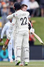 CHRISTCHURCH, NEW ZEALAND - JANUARY 05: Henry Nicholls of New Zealand (R) is congratulated by Kane Williamson of New Zealand after scoring a century during day three of the Second Test match in the series between New Zealand and Pakistan at Hagley Oval on January 05, 2021 in Christchurch, New Zealand. (Photo by Kai Schwoerer/Getty Images)