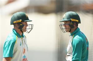 SYDNEY, AUSTRALIA - JANUARY 05: Tim Paine of Australia talks to Marnus Labuschagne of Australia during an Australian nets session at the Sydney Cricket Ground on January 05, 2021 in Sydney, Australia. (Photo by Mark Metcalfe/Getty Images)