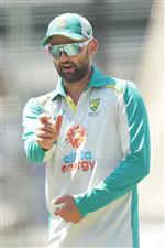 SYDNEY, AUSTRALIA - JANUARY 05: Nathan Lyon of Australia speaks to Will Pucovski of Australia during an Australian nets session at the Sydney Cricket Ground on January 05, 2021 in Sydney, Australia. (Photo by Mark Metcalfe/Getty Images)