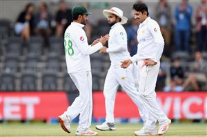 CHRISTCHURCH, NEW ZEALAND - JANUARY 05: Mohammad Abbas of Pakistan (R) is congratulated by Zafar Gohar of Pakistan after dismissing Henry Nicholls of New Zealand during day three of the Second Test match in the series between New Zealand and Pakistan at Hagley Oval on January 05, 2021 in Christchurch, New Zealand. (Photo by Kai Schwoerer/Getty Images)