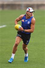 MELBOURNE, AUSTRALIA - JANUARY 06: Bailey Smith of the Bulldogs kicks the ball during a Western Bulldogs AFL training session at Whitten Oval on January 06, 2021 in Melbourne, Australia. (Photo by Mike Owen/Getty Images)
