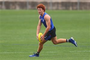 MELBOURNE, AUSTRALIA - JANUARY 06: Ed Richards of the Bulldogs runs with the ball during a Western Bulldogs AFL training session at Whitten Oval on January 06, 2021 in Melbourne, Australia. (Photo by Mike Owen/Getty Images)