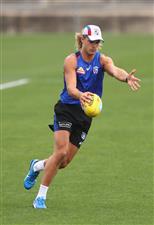 MELBOURNE, AUSTRALIA - JANUARY 06: Bailey Smith of the Bulldogs kicks the ball during a Western Bulldogs AFL training session at Whitten Oval on January 06, 2021 in Melbourne, Australia. (Photo by Mike Owen/Getty Images)