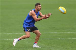 MELBOURNE, AUSTRALIA - JANUARY 06: Ben Cavarra of the Bulldogs marks the ball during a Western Bulldogs AFL training session at Whitten Oval on January 06, 2021 in Melbourne, Australia. (Photo by Mike Owen/Getty Images)