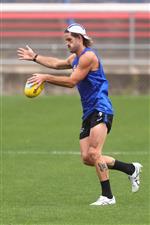 MELBOURNE, AUSTRALIA - JANUARY 06: Josh Bruce kicks the ball during a Western Bulldogs AFL training session at Whitten Oval on January 06, 2021 in Melbourne, Australia. (Photo by Mike Owen/Getty Images)