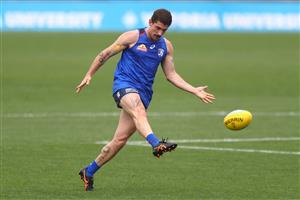 MELBOURNE, AUSTRALIA - JANUARY 06: Tom Liberatore of the Bulldogs kicks the ball during a Western Bulldogs AFL training session at Whitten Oval on January 06, 2021 in Melbourne, Australia. (Photo by Mike Owen/Getty Images)
