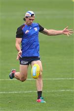 MELBOURNE, AUSTRALIA - JANUARY 06: Easton Wood of the Bulldogs kicks the ball during a Western Bulldogs AFL training session at Whitten Oval on January 06, 2021 in Melbourne, Australia. (Photo by Mike Owen/Getty Images)