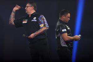 LONDON, ENGLAND - JANUARY 03: Gary Anderson of Scotland in action during the Finals against Gerwyn Price of Wales during Day Sixteen of The PDC William Hill World Darts Championship at Alexandra Palace on January 03, 2021 in London, England. (Photo by Luke Walker/Getty Images)