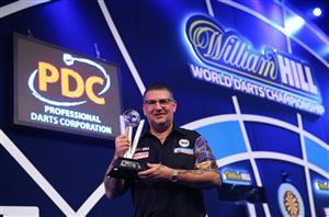 LONDON, ENGLAND - JANUARY 03: Gary Anderson of Scotland poses with the runners-up trophy during the Finals against Gerwyn Price of Wales during Day Sixteen of The PDC William Hill World Darts Championship at Alexandra Palace on January 03, 2021 in London, England. (Photo by Luke Walker/Getty Images)