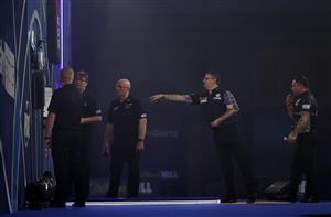 LONDON, ENGLAND - JANUARY 03: Gary Anderson of Scotland in action during the Finals against Gerwyn Price of Wales during Day Sixteen of The PDC William Hill World Darts Championship at Alexandra Palace on January 03, 2021 in London, England. (Photo by Luke Walker/Getty Images)