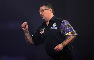 LONDON, ENGLAND - JANUARY 03: Gary Anderson of Scotland in action during the Finals against Gerwyn Price of Wales during Day Sixteen of The PDC William Hill World Darts Championship at Alexandra Palace on January 03, 2021 in London, England. (Photo by Luke Walker/Getty Images)