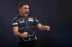 LONDON, ENGLAND - JANUARY 03: Gerwyn Price of Wales reacts during the Finals against Gary Anderson of Scotland during Day Sixteen of The PDC William Hill World Darts Championship at Alexandra Palace on January 03, 2021 in London, England. (Photo by Luke Walker/Getty Images)
