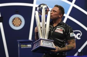 LONDON, ENGLAND - JANUARY 03: Gerwyn Price of Wales poses with the trophy during the Finals against Gary Anderson of Scotlandduring Day Sixteen of The PDC William Hill World Darts Championship at Alexandra Palace on January 03, 2021 in London, England. (Photo by Luke Walker/Getty Images)