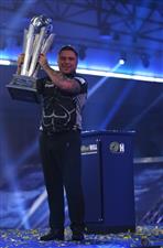 LONDON, ENGLAND - JANUARY 03: Gerwyn Price of Wales poses with the trophy during the Finals against Gary Anderson of Scotlandduring Day Sixteen of The PDC William Hill World Darts Championship at Alexandra Palace on January 03, 2021 in London, England. (Photo by Luke Walker/Getty Images)