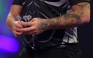 LONDON, ENGLAND - JANUARY 03: Gerwyn Price of Wales in action during the Finals against Gary Anderson of Scotlandduring Day Sixteen of The PDC William Hill World Darts Championship at Alexandra Palace on January 03, 2021 in London, England. (Photo by Luke Walker/Getty Images)
