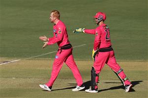 PERTH, AUSTRALIA - JANUARY 06: Lloyd Pope of the Sixers celebrates the wicket of Jason Roy of the Scorchers during the Big Bash League match between the Perth Scorchers and the Sydney Sixers at Optus Stadium, on January 06, 2021, in Perth, Australia. (Photo by Paul Kane/Getty Images)