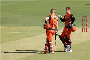 PERTH, AUSTRALIA - JANUARY 06: Liam Livingstone and Jason Roy of the Scorchers talk mid wicket during the Big Bash League match between the Perth Scorchers and the Sydney Sixers at Optus Stadium, on January 06, 2021, in Perth, Australia. (Photo by Paul Kane/Getty Images)