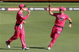 PERTH, AUSTRALIA - JANUARY 06: Jordan Silk of the Sixers and Daniel Christian of the Sixers celebrate the wicket of Liam Livingstone of the Scorchers during the Big Bash League match between the Perth Scorchers and the Sydney Sixers at Optus Stadium, on January 06, 2021, in Perth, Australia. (Photo by Paul Kane/Getty Images)