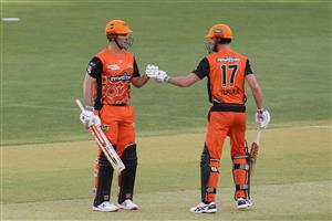 PERTH, AUSTRALIA - JANUARY 06: Mitch Marsh of the Scorchers celebrates with Ashton Turner after reaching his half century during the Big Bash League match between the Perth Scorchers and the Sydney Sixers at Optus Stadium, on January 06, 2021, in Perth, Australia. (Photo by Paul Kane/Getty Images)