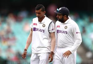 SYDNEY, AUSTRALIA - JANUARY 07: Rohit Sharma of India speaks to Navdeep Saini of India during day one of the 3rd Test match in the series between Australia and India at Sydney Cricket Ground on January 07, 2021 in Sydney, Australia. (Photo by Ryan Pierse/Getty Images)