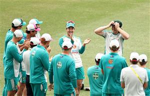 SYDNEY, AUSTRALIA - JANUARY 07: Will Pucovski of Australia receives his Baggy Green Cap as Tim Paine of Australia celebrates during day one of the 3rd Test match in the series between Australia and India at Sydney Cricket Ground on January 07, 2021 in Sydney, Australia. (Photo by Ryan Pierse/Getty Images)