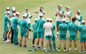 SYDNEY, AUSTRALIA - JANUARY 07: Will Pucovski of Australia receives his Baggy Green Cap as Tim Paine of Australia celebrates during day one of the 3rd Test match in the series between Australia and India at Sydney Cricket Ground on January 07, 2021 in Sydney, Australia. (Photo by Ryan Pierse/Getty Images)